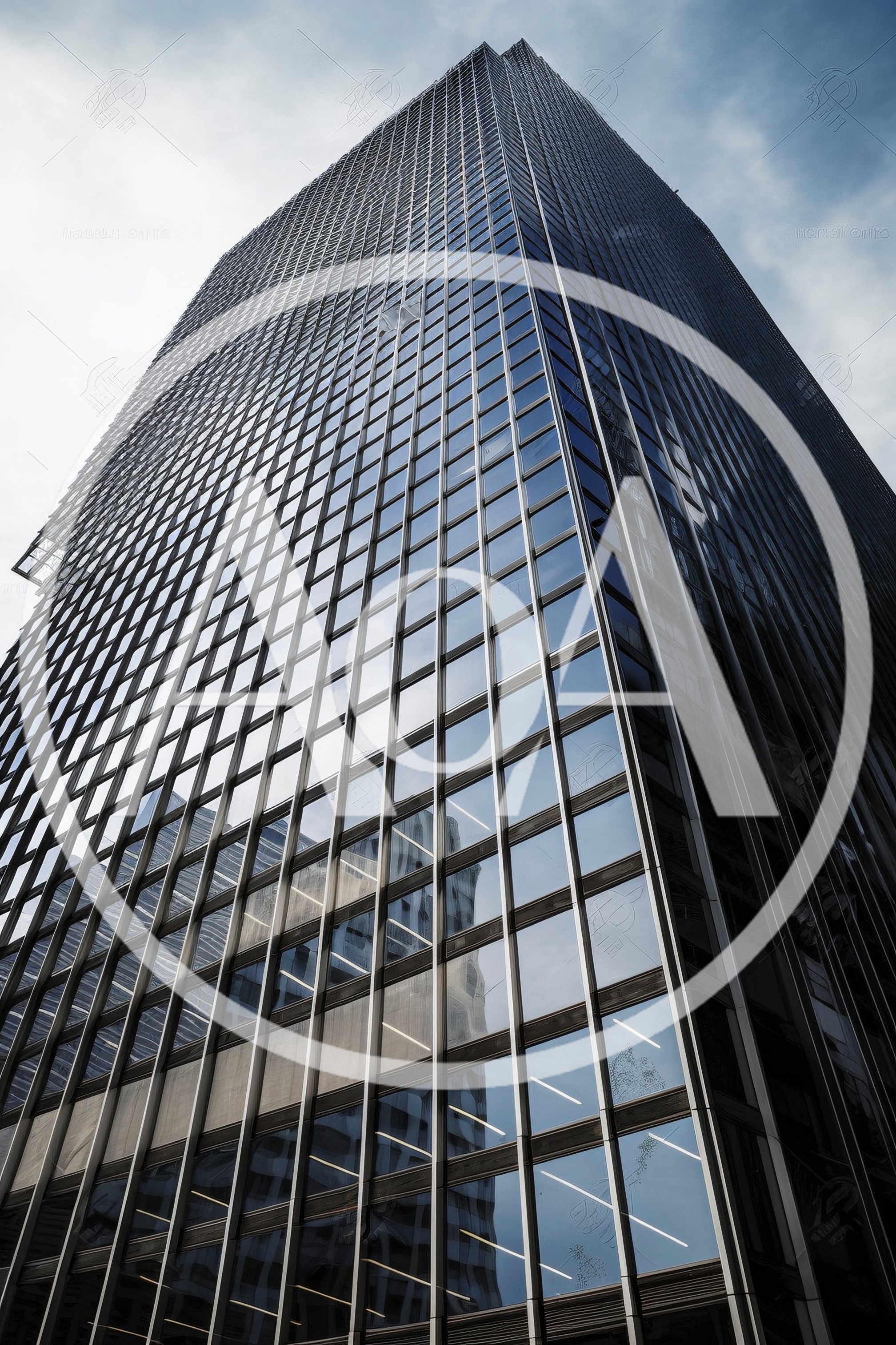 Low Angle View Of Modern Glass Skyscraper
