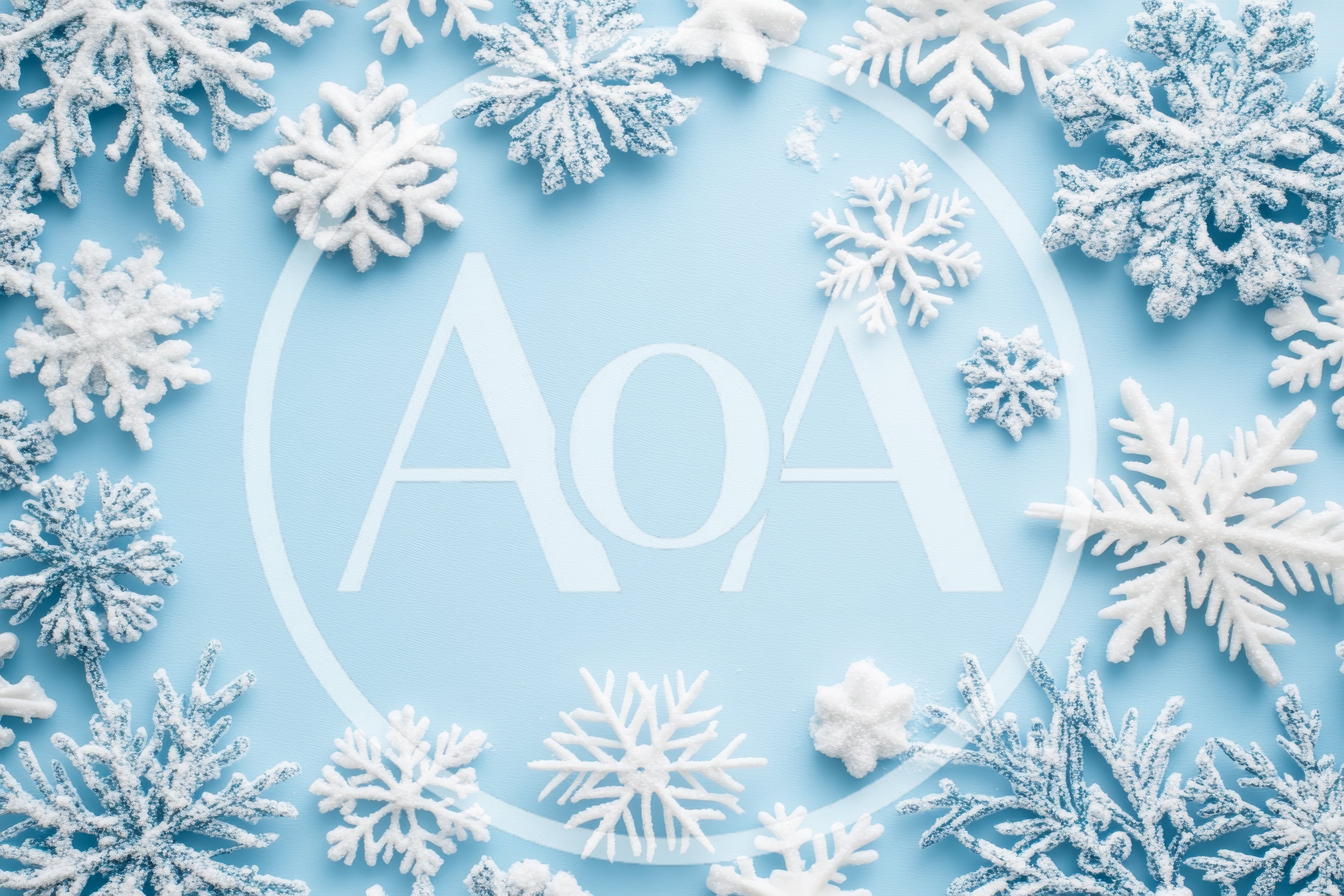 Decorative White Snowflakes On Light Blue Background