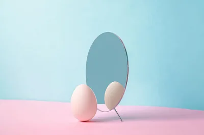 Minimalist Still Life With Pink Egg And Mirror