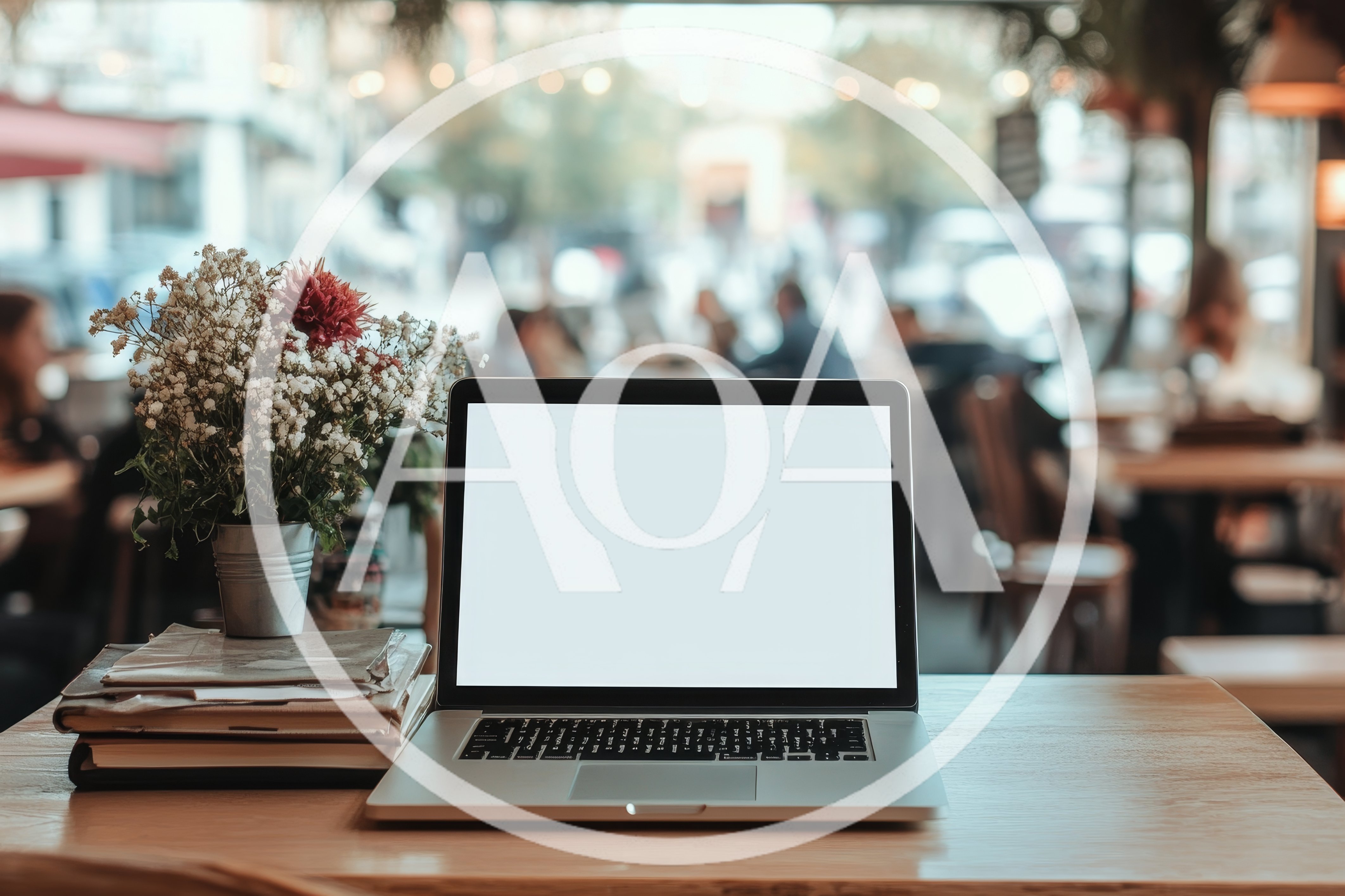 Laptop With Blank Screen On Cafe Table