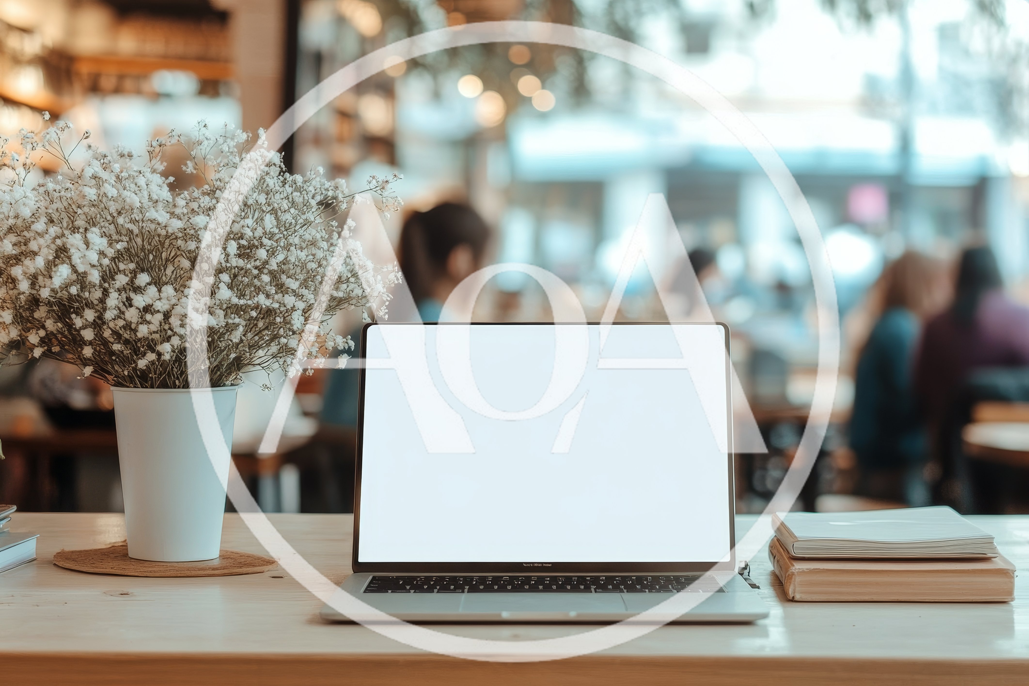Laptop With Blank Screen On Cafe Table