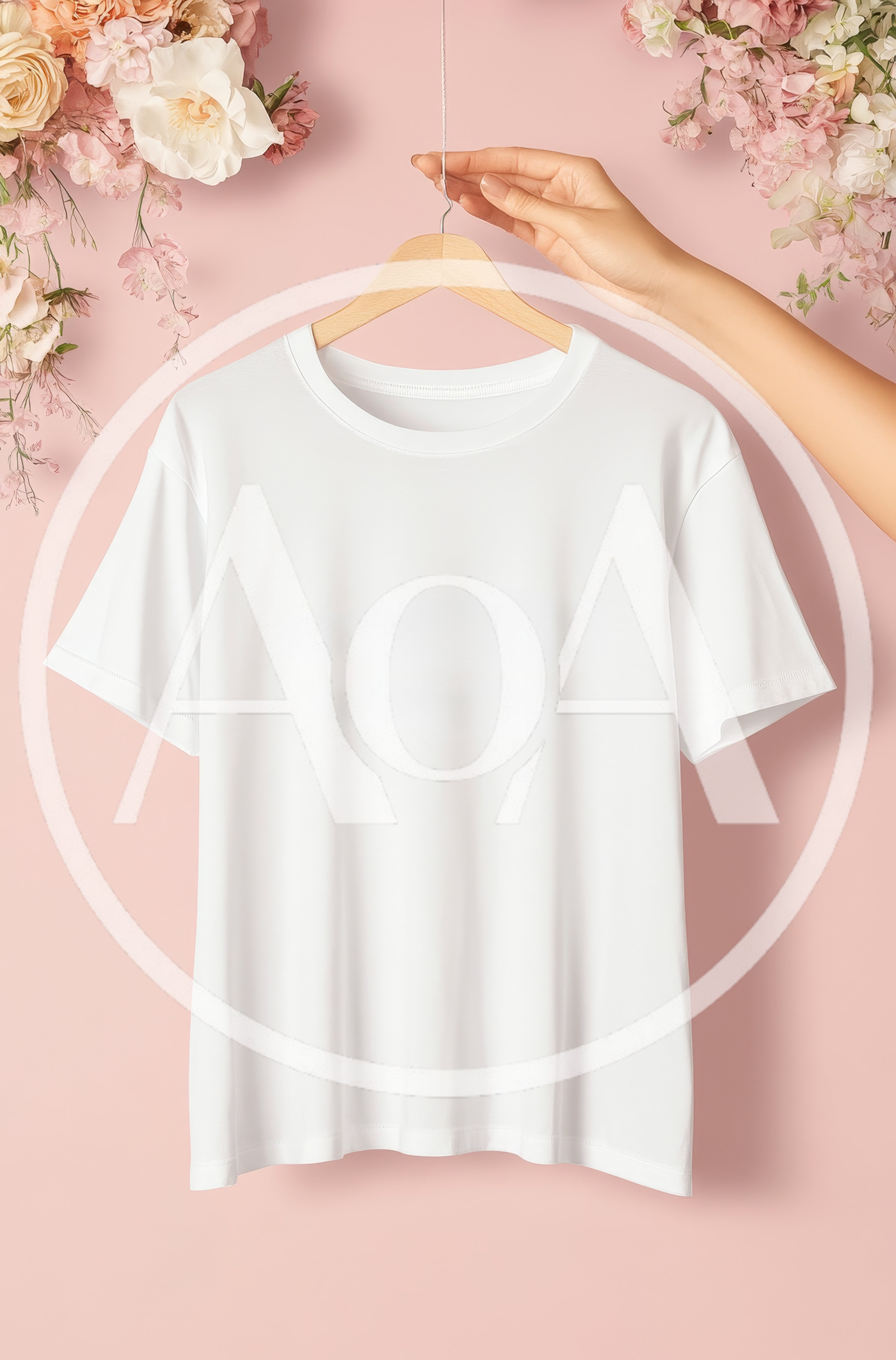 Hand Holding A Blank White T-Shirt On A Hanger