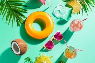 Summer Vacation Flat Lay With Tropical Drinks And Accessories