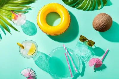 Summer Vacation Flat Lay With Tropical Drinks And Accessories