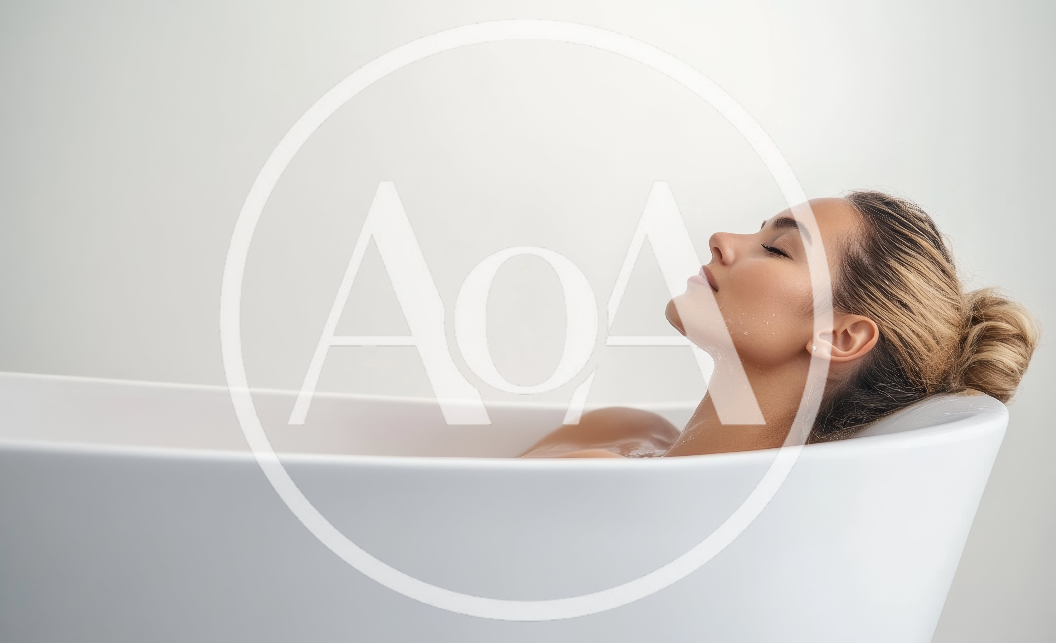 Young Woman Relaxing In A White Bathtub