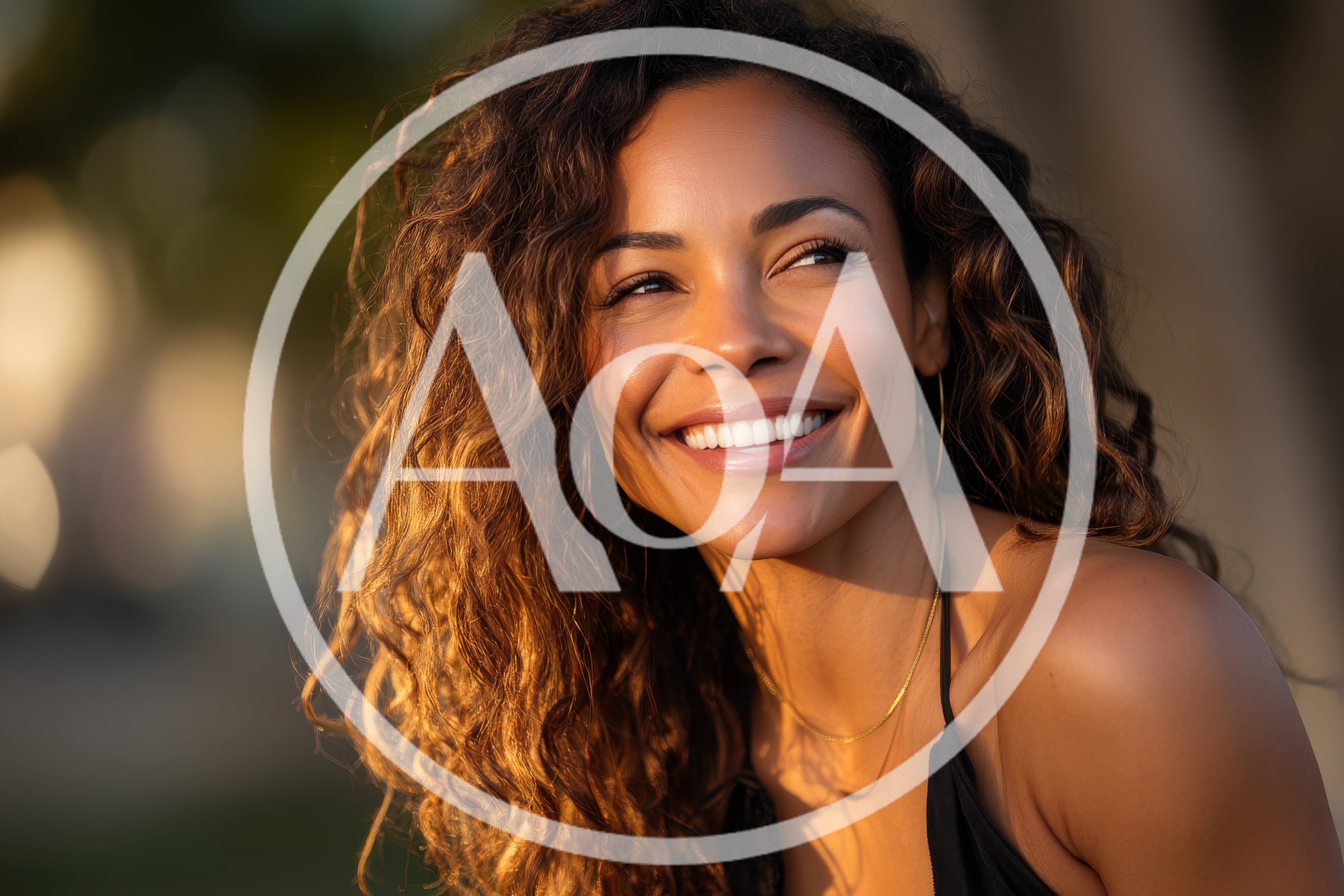 Portrait Of A Smiling Woman With Curly Hair