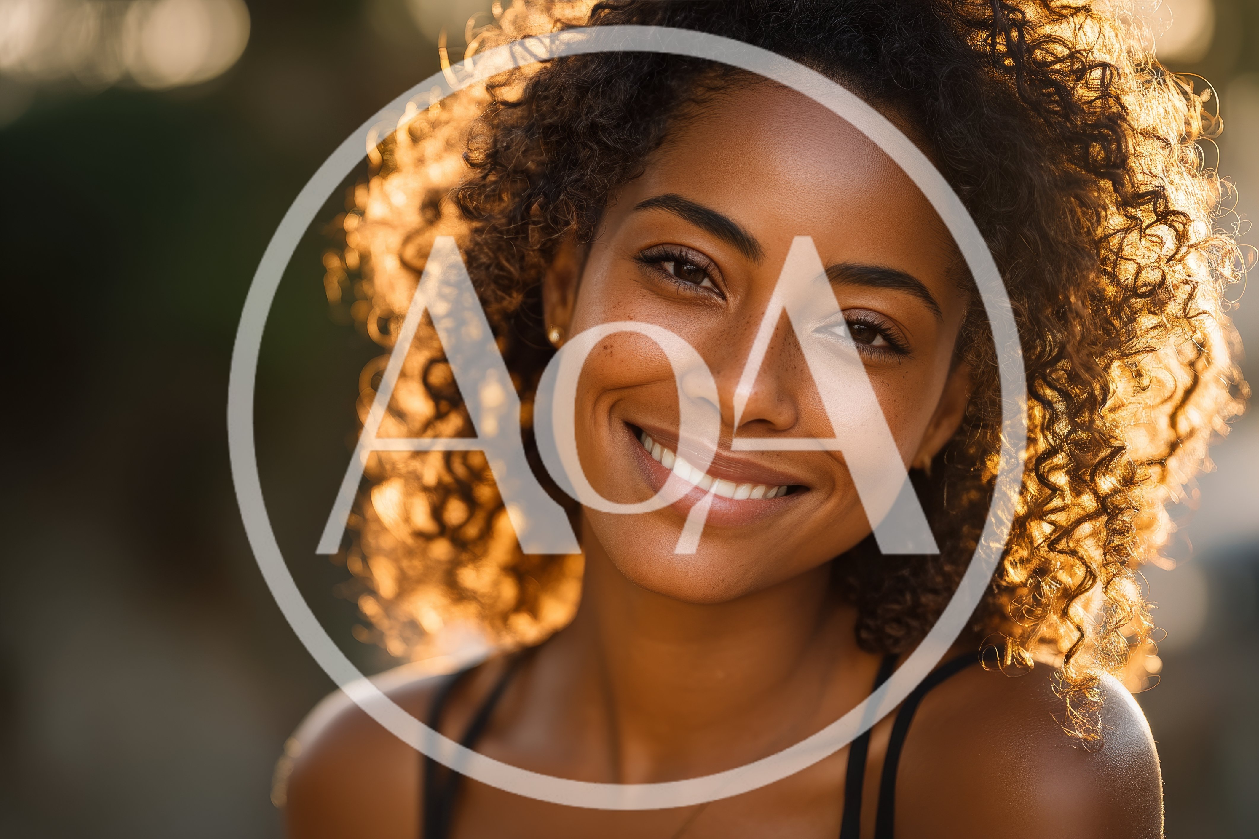 Portrait Of A Smiling Woman With Curly Hair
