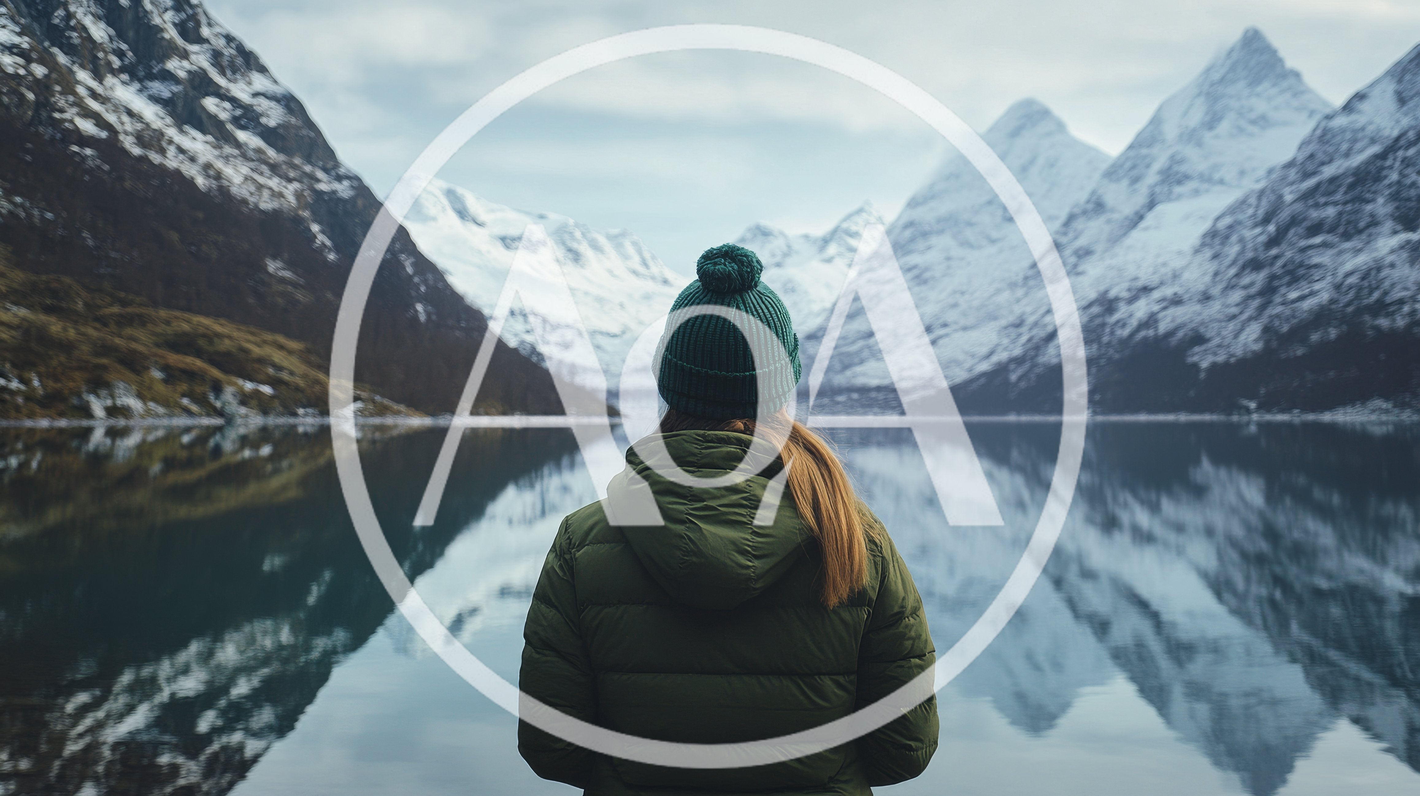 Woman Standing Before Snowy Mountains And Lake