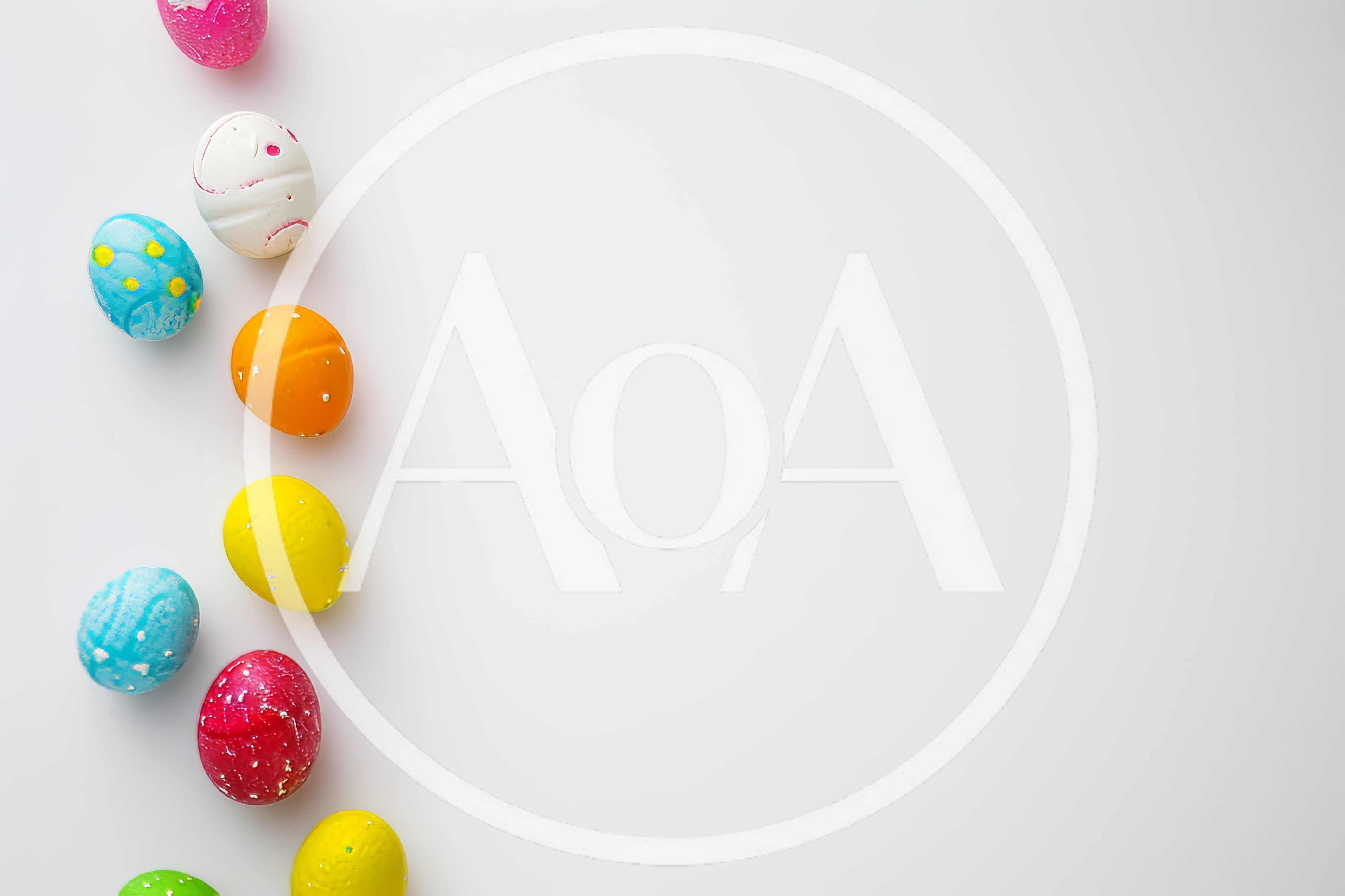 Colorful Easter Eggs Arranged On White Background