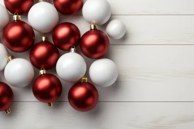 Red and White Christmas Ornaments on Wooden Background