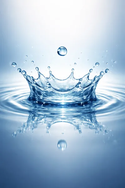 Water Crown Splash With Floating Droplet