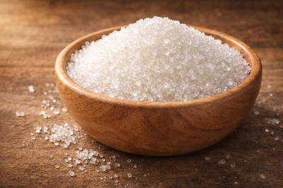 Wooden Bowl Filled With White Granulated Sugar