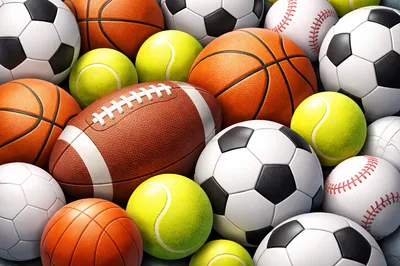 Assorted Sports Balls Pile Including Soccer Basketball And Football