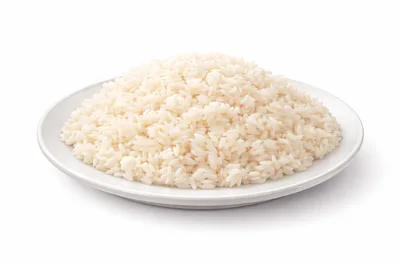 A Mound Of Cooked White Rice On A Plate