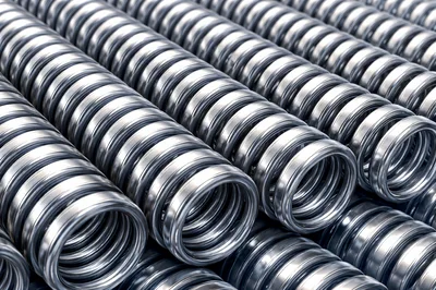 Industrial Metal Coil Springs Stacked In Rows