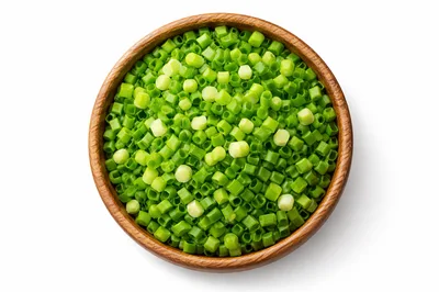 Chopped Green Scallions In A Wooden Bowl