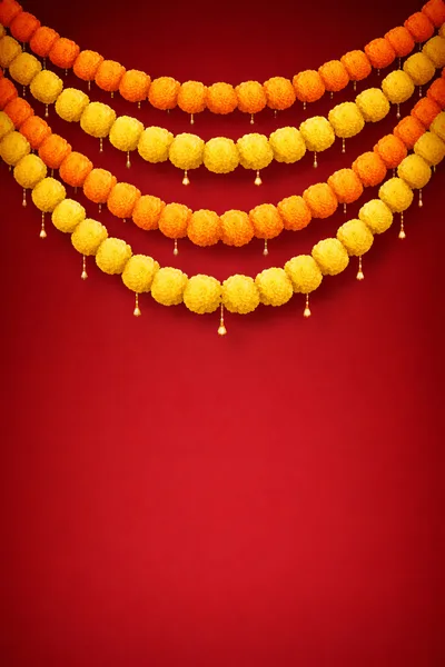 Festive Marigold Flower Garlands On Red Background