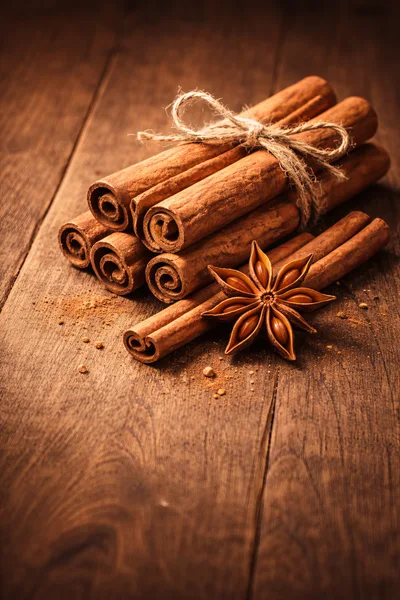 Cinnamon Sticks and Star Anise on Wooden Table