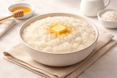 Bowl Of Creamy Rice Porridge With Butter