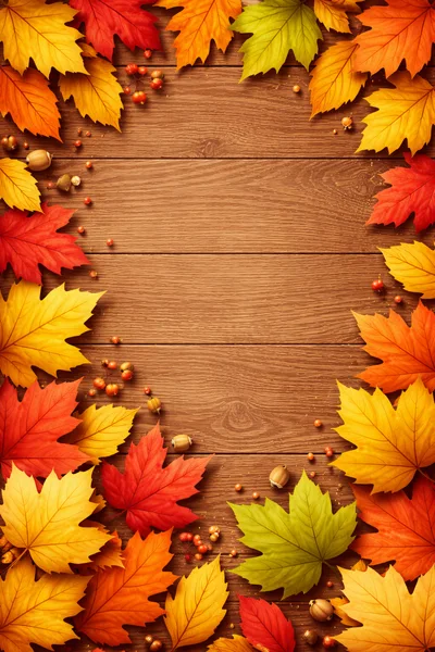 Autumn Maple Leaves Border On Wooden Background