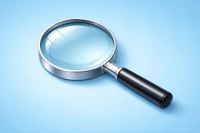 Magnifying Glass With Black Handle On Blue Background