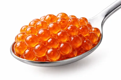 Metal Spoon Filled With Fresh Red Salmon Caviar