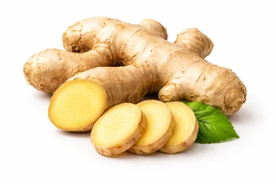 Fresh Ginger Root With Slices And Green Leaf