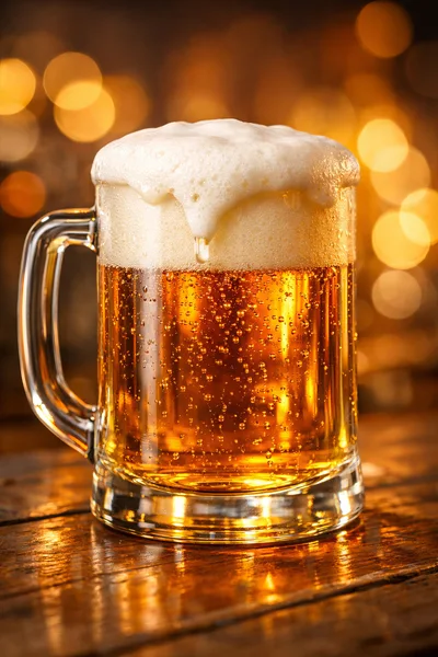 Glass Mug Of Golden Beer With Thick Foam
