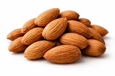 A Pile Of Raw Almonds On White Background