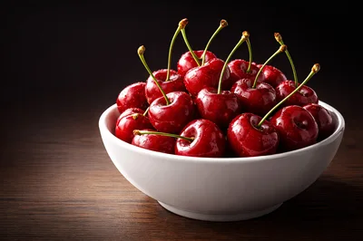 Fresh Red Cherries In A White Bowl