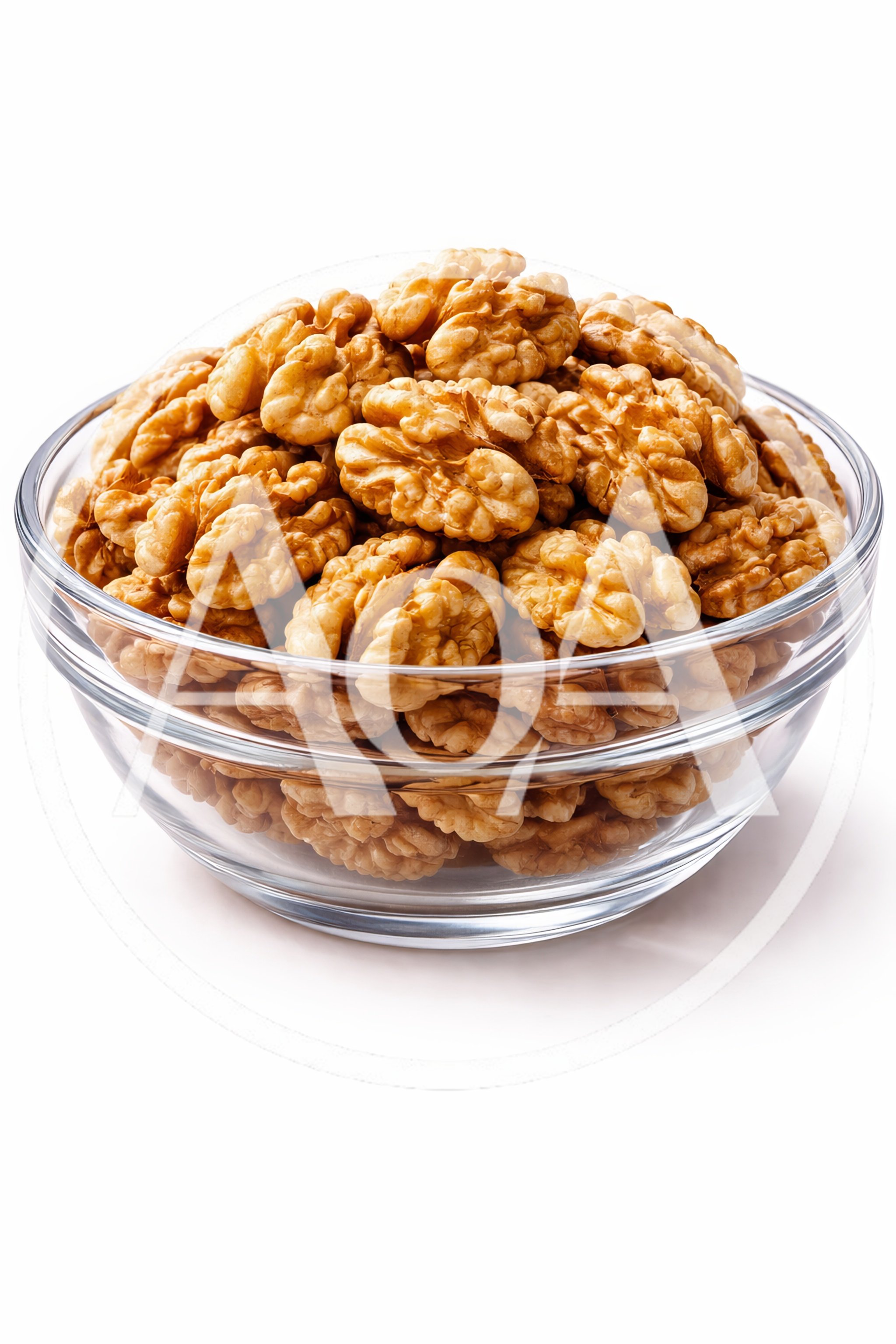 Glass Bowl Filled With Shelled Walnut Halves