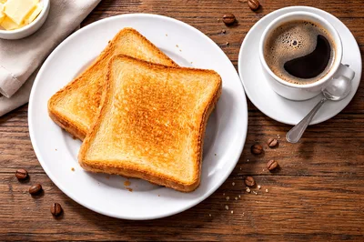 Breakfast Toast With Coffee On Wooden Table