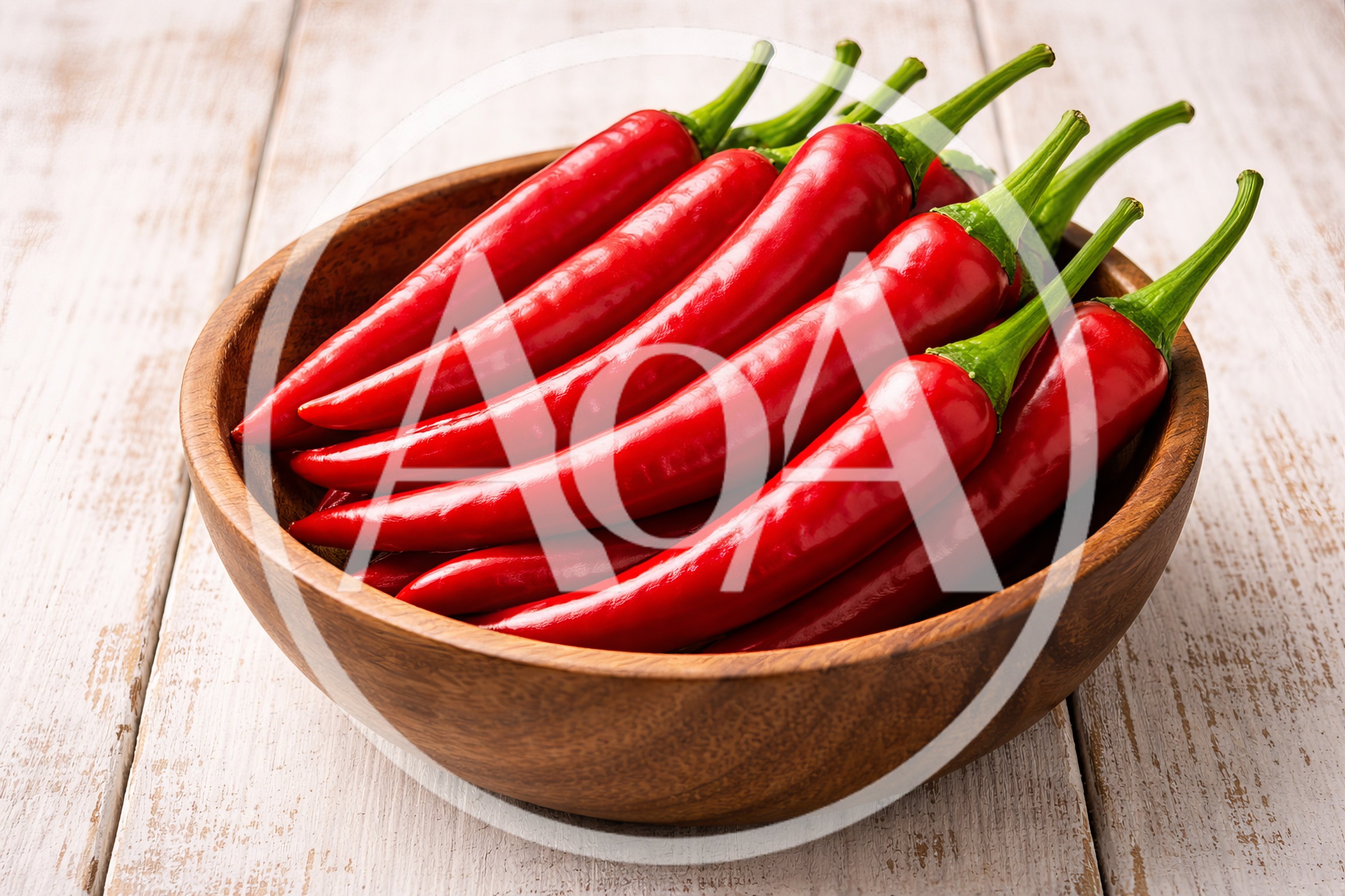 Fresh Red Chili Peppers In A Wooden Bowl