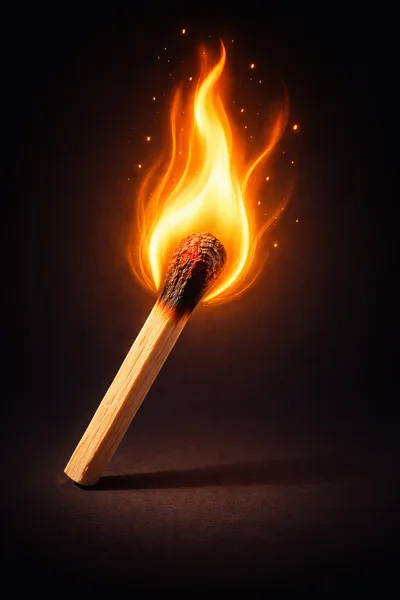 Burning Wooden Matchstick With Bright Orange Flame