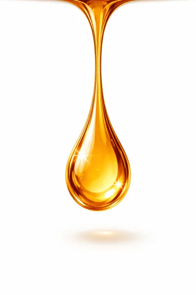 Golden Liquid Drop Falling Against White Background