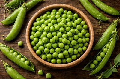 Fresh Green Peas in a Wooden Bowl