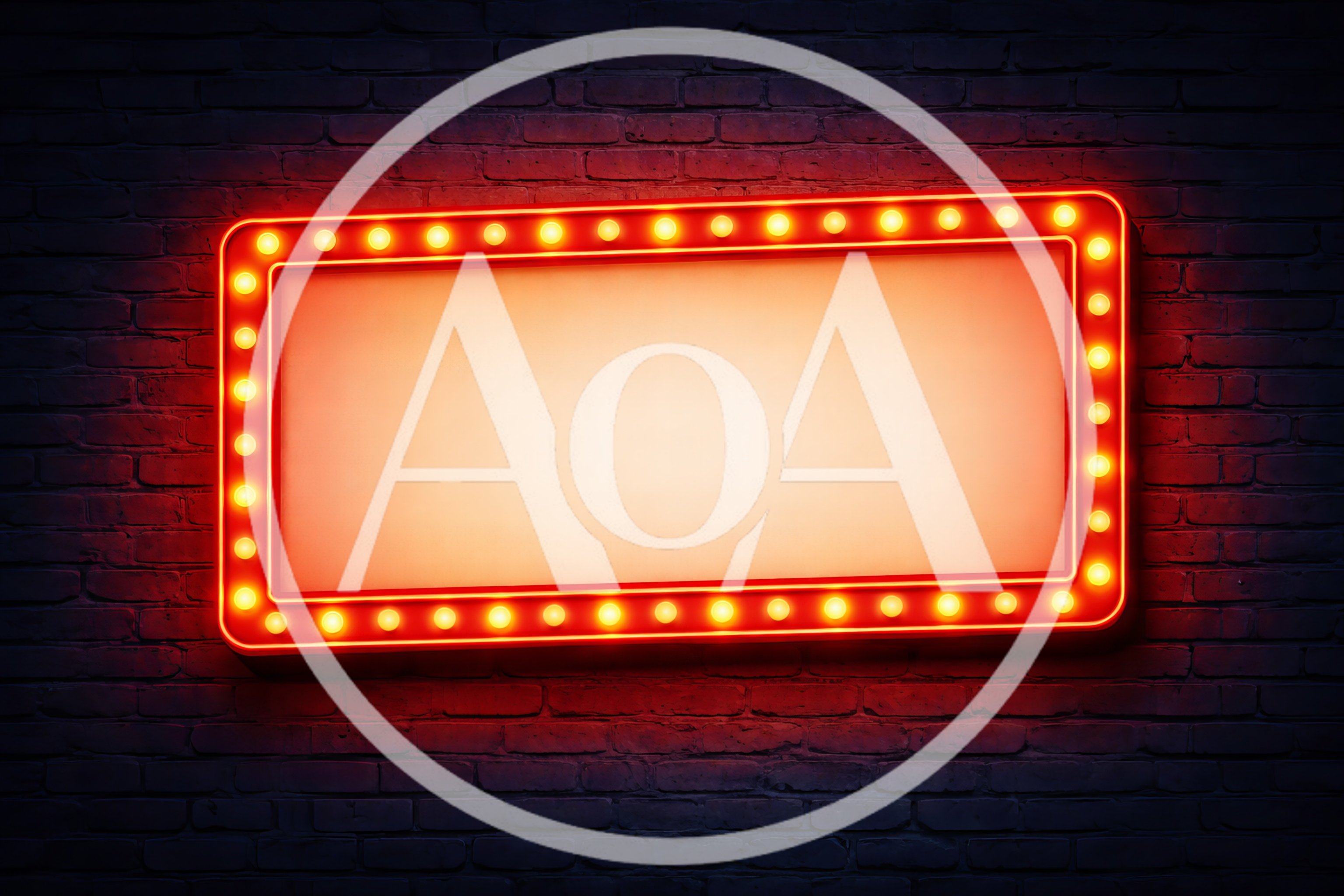 Illuminated Rectangular Marquee Sign On Dark Brick Wall