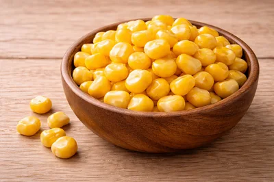 Wooden Bowl Filled With Sweet Yellow Corn Kernels