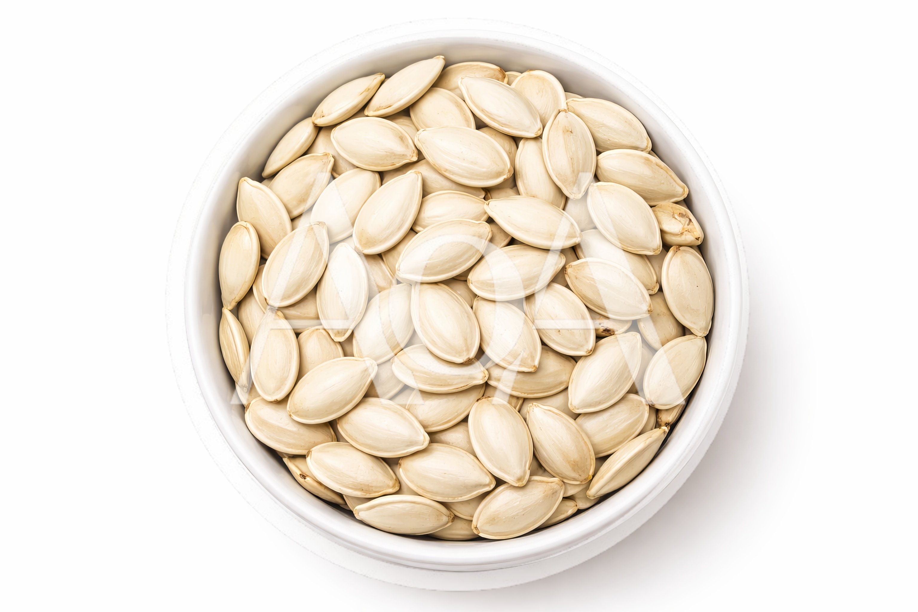 Top View Of Pumpkin Seeds In White Bowl