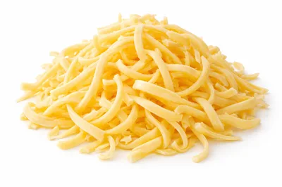 Pile Of Shredded Yellow Cheddar Cheese
