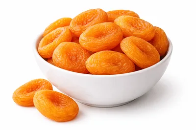 Bowl Of Dried Apricots On White Background