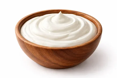 Creamy Yogurt In A Wooden Bowl