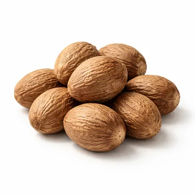 A Pile Of Whole Nutmeg Seeds