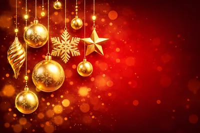 Golden Christmas Ornaments Hanging Against Red Bokeh Background