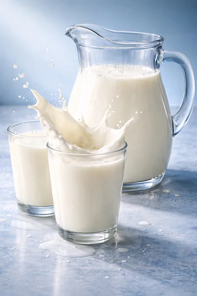 Fresh Milk Splashing From A Glass Pitcher