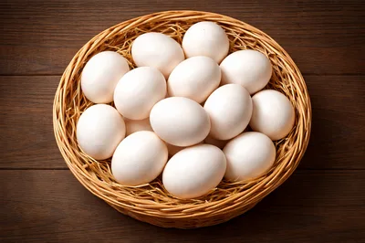 Fresh White Chicken Eggs In A Woven Basket