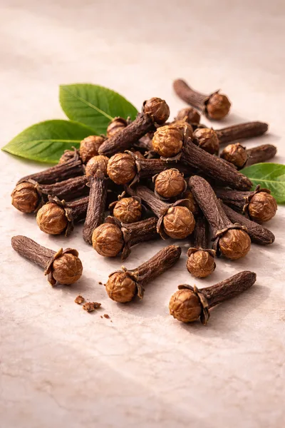 Dried Whole Cloves With Green Leaves