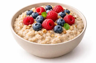 Bowl Of Creamy Oatmeal With Fresh Berries