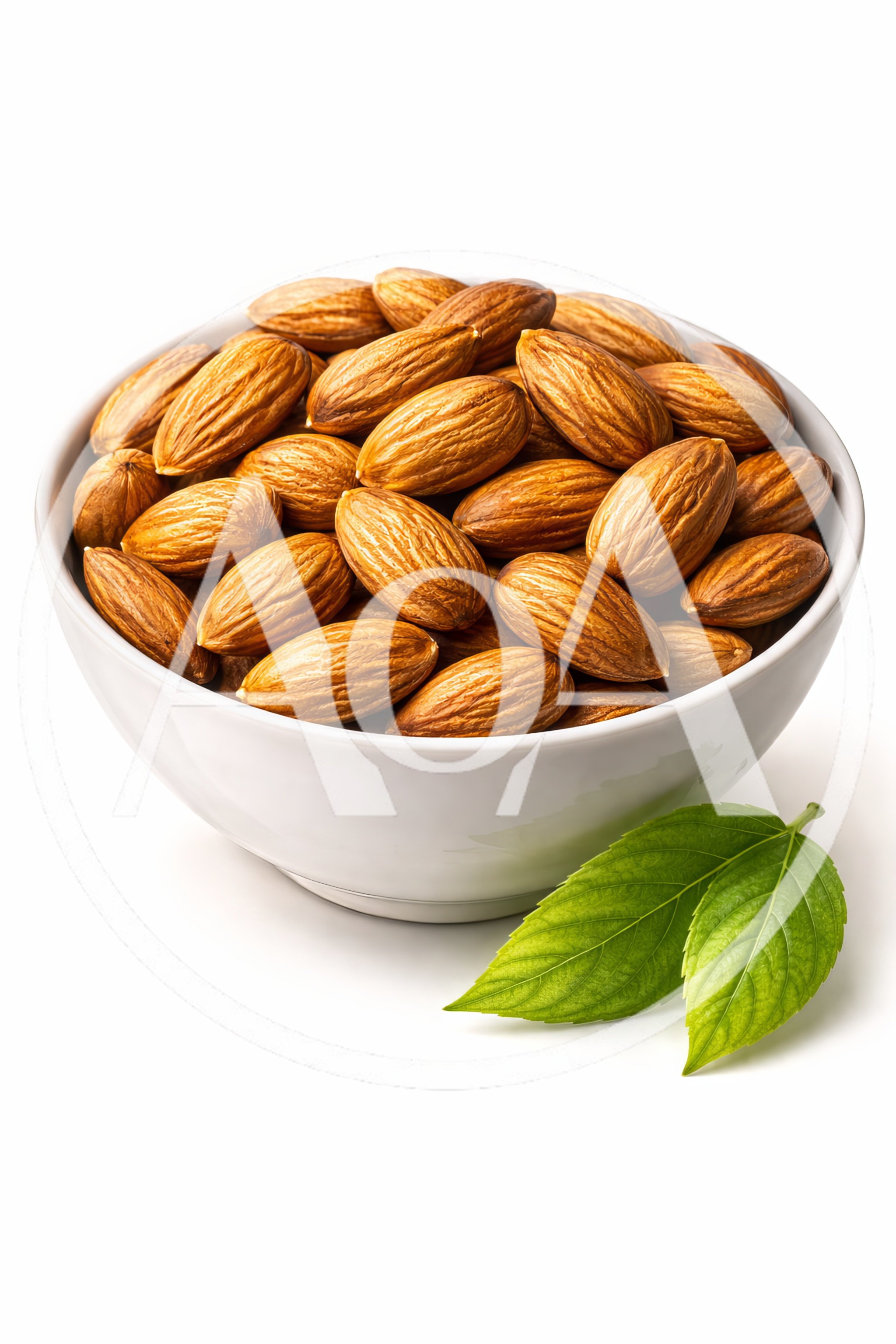 Bowl Of Raw Almonds With Green Leaves