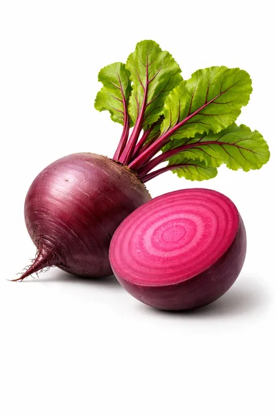 Fresh Whole And Sliced Beetroot With Green Leaves